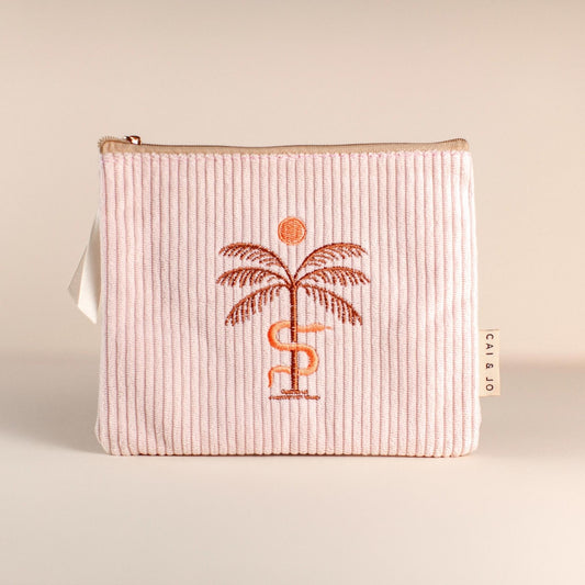 Pochette en forme de paume rose pâle